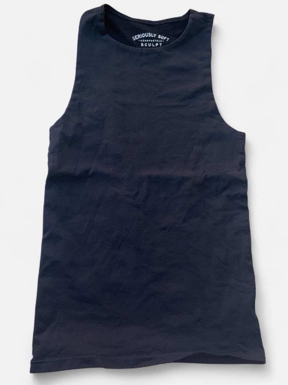 Black tank top with a relaxed fit